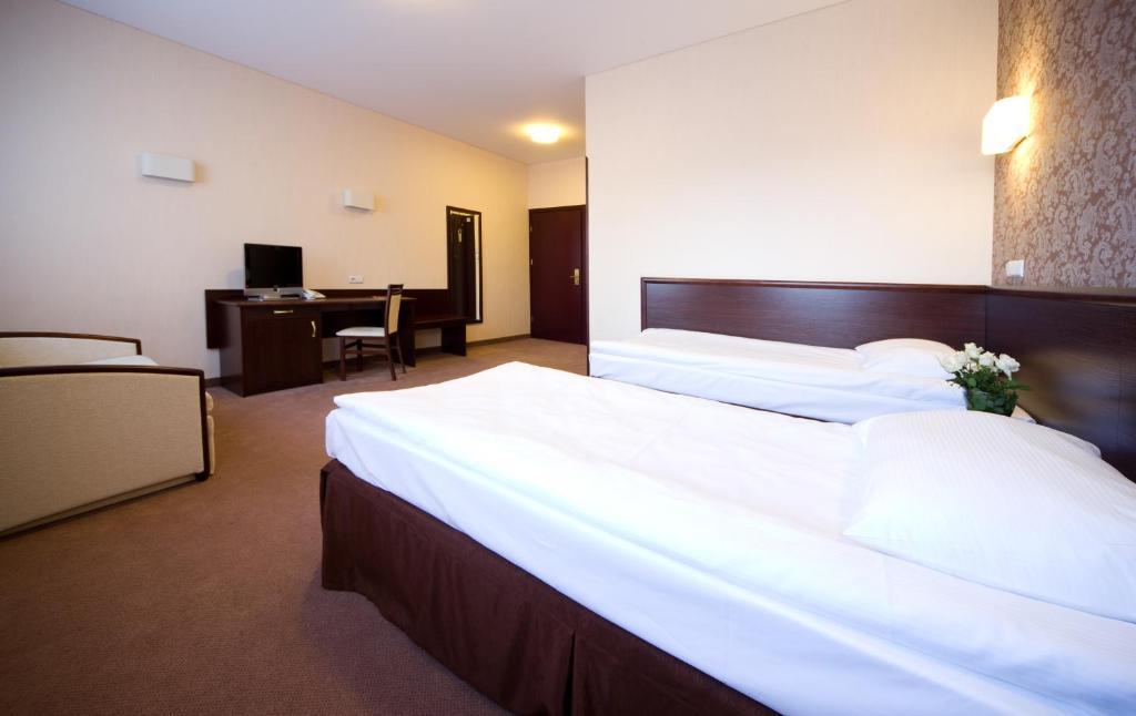 Hotel Centrum Квидзин Стая снимка