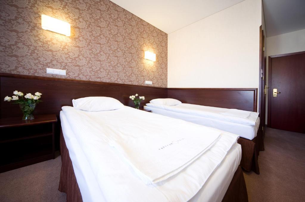 Hotel Centrum Квидзин Стая снимка