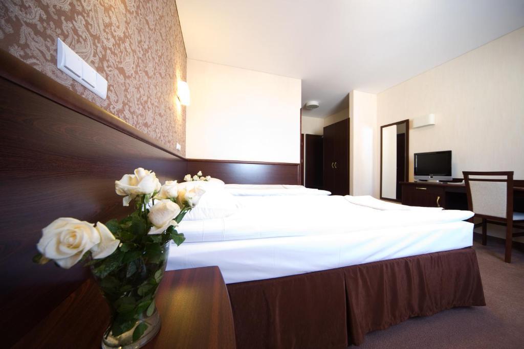 Hotel Centrum Квидзин Стая снимка